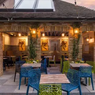 From delivery yard to Kingston’s coolest courtyard!

We take a look back at our recent pub garden project for The Kings Tun in Kingston which opened in March 2026. 

Here a former back-of-house delivery yard has been transformed beyond recognition, into a vibrant beer garden full of character to be enjoyed year-round. 

A disused toilet block has been converted to provide a sheltered fixed seating area, with details inspired by its former use. Reclaimed toilet cisterns have been reimagined as sculptural art pieces spray-painted by local street artists as well as being used in their raw form repurposed as ‘hanging baskets’. 

A mixture of stamped concrete, granite pavers and resin bonded gravel help to define zoned areas of the courtyard, while a range of loose pots, fixed planters and climbers soften the industrial backdrop.

Working with main contractors @stenball_group and landscape specialists - DCI Enterprises Ltd to bring this vision to life.

#TheKingsTun #KingstonUponThames #PubDesign #GardenDesign #UpcycledArt #StreetArt #BeerGarden #InteriorDesign #TransformationTuesday #HospitalityDesign #BarDesign #BeerGarden